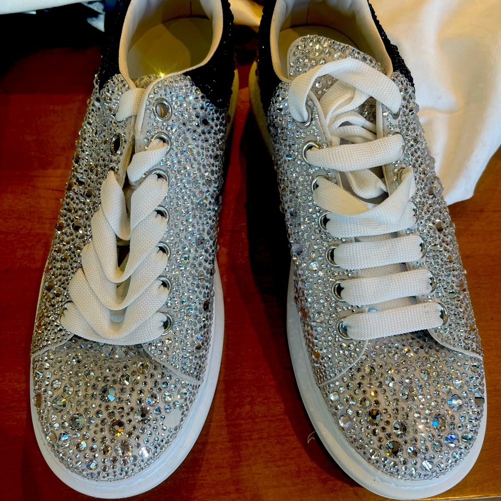 Chunky sole sneakers with two-tone crystal embellishments throughout.